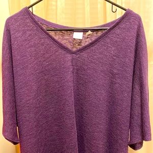 Purple quarter sleeved NY & Company sweater.